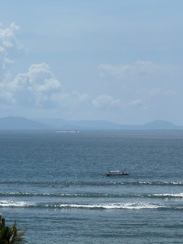 Peaceful morning coastal scenes documented across Denpasar, Indonesia
