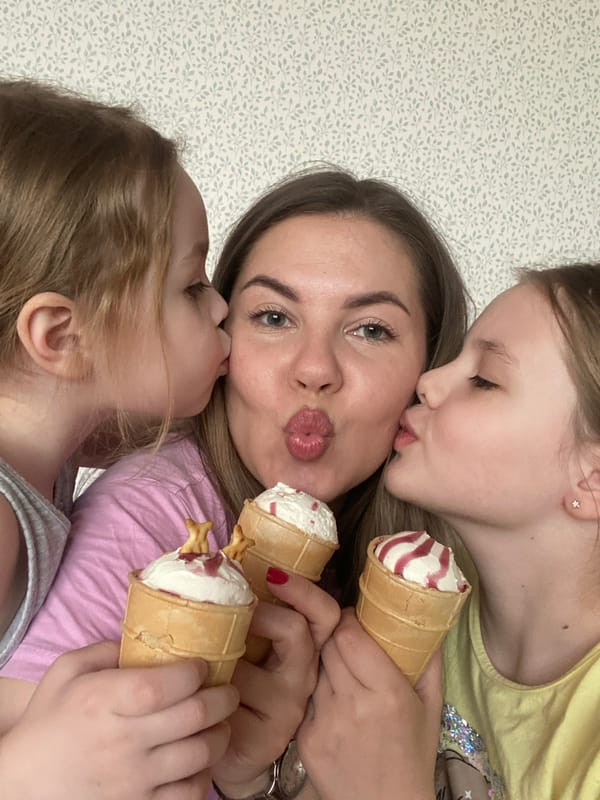 Woman and girls share ice cream, quiet moments in Izhevsk