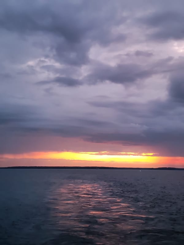 Dusk settles over still Russian waters at golden hour