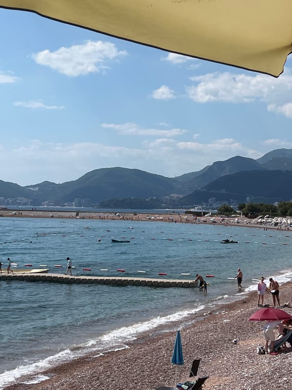 Sun, sea, and stone walls at Sveti Stefan's Adriatic coast