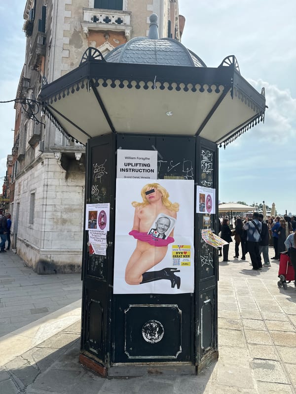 Vandalized ornate kiosk documented in Venice with graffiti, posters