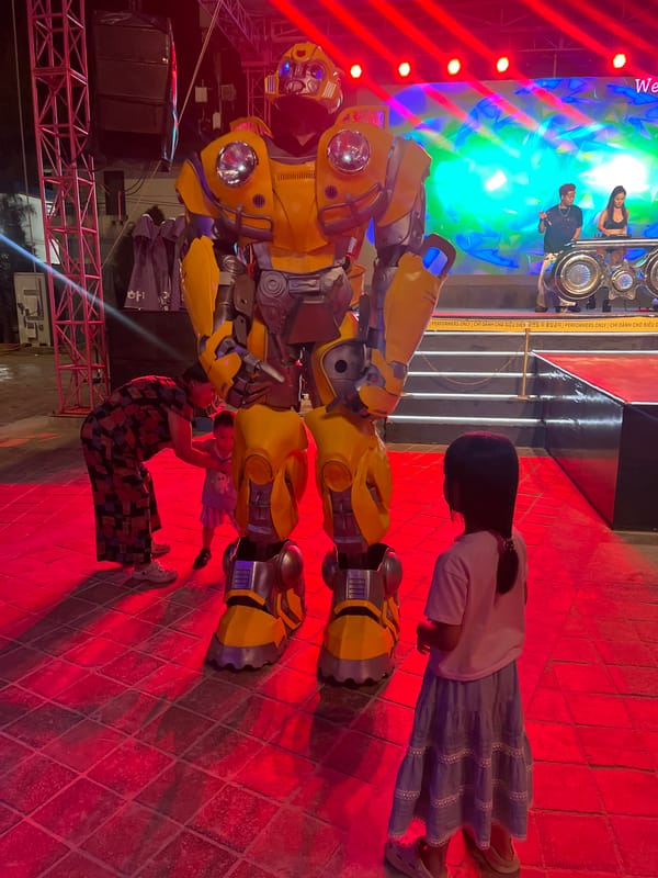 Beachfront night event in Đà Nẵng with live DJs, dancers, and Bumblebee