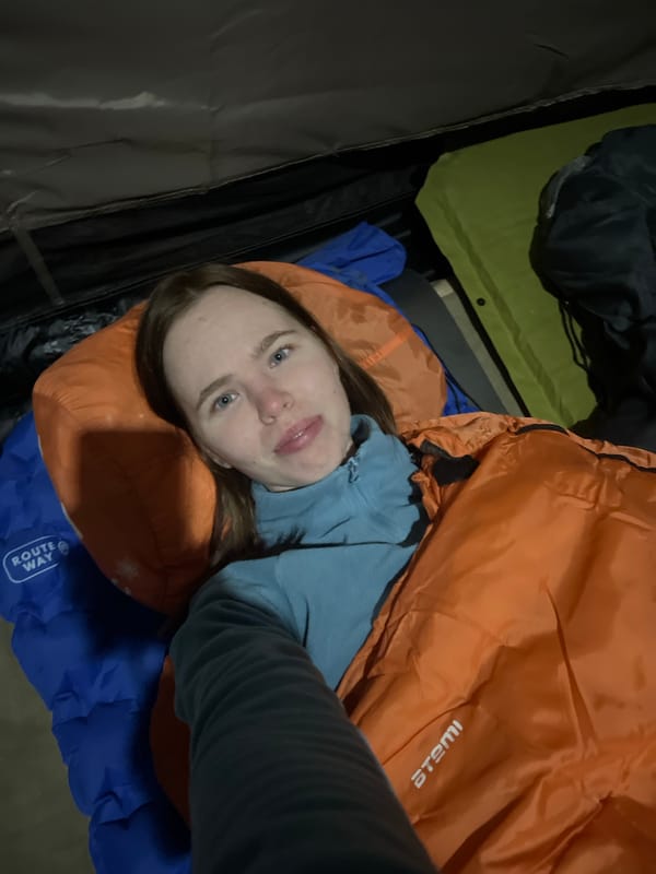 Woman takes tent selfie during camping trip in Russia