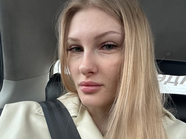 Woman takes car selfies in Perm, Russia