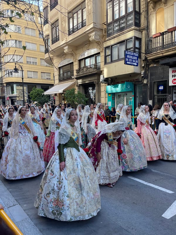 Traditional Fallas festival procession draws crowds in Valencia streets
