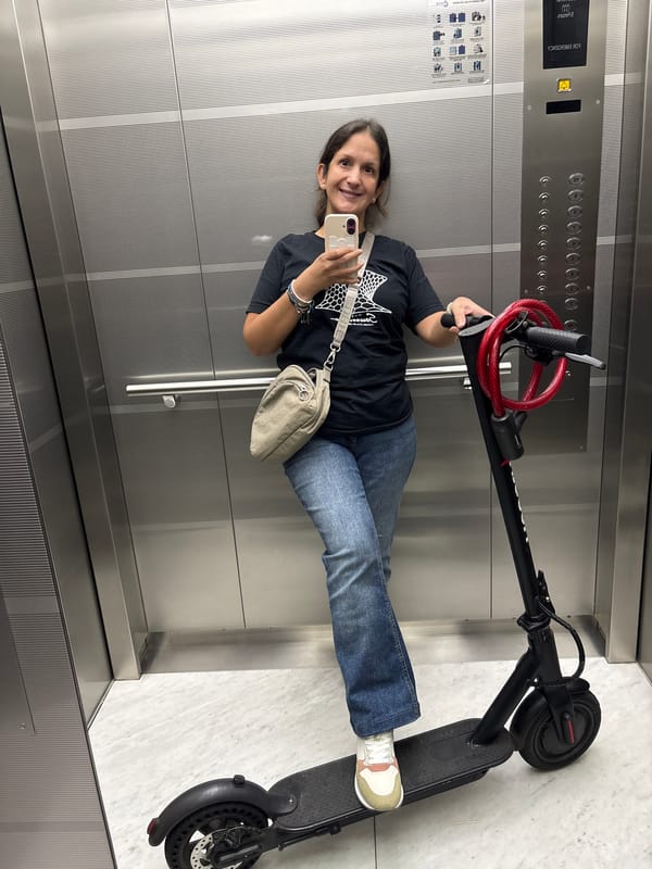 Woman takes smiling elevator selfie in San Isidro