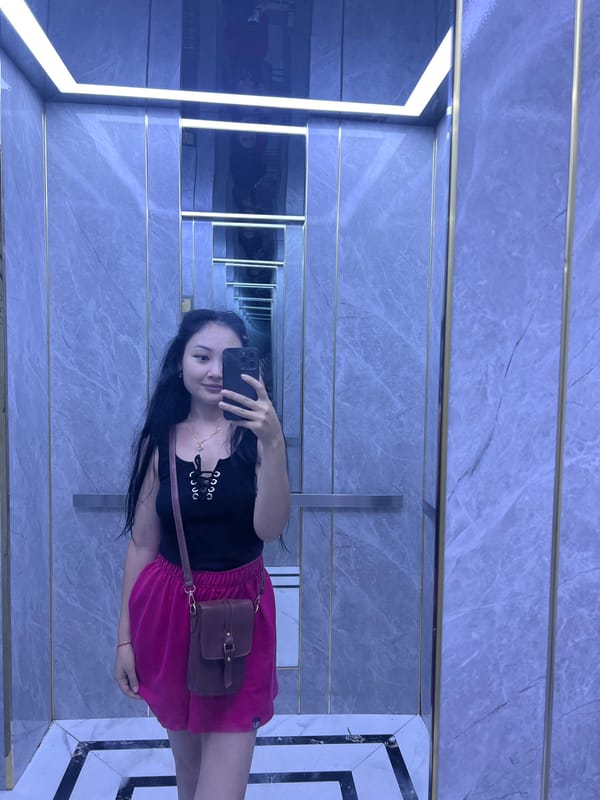 Everyday moments captured in Nha Trang: elevator selfie, decorated street