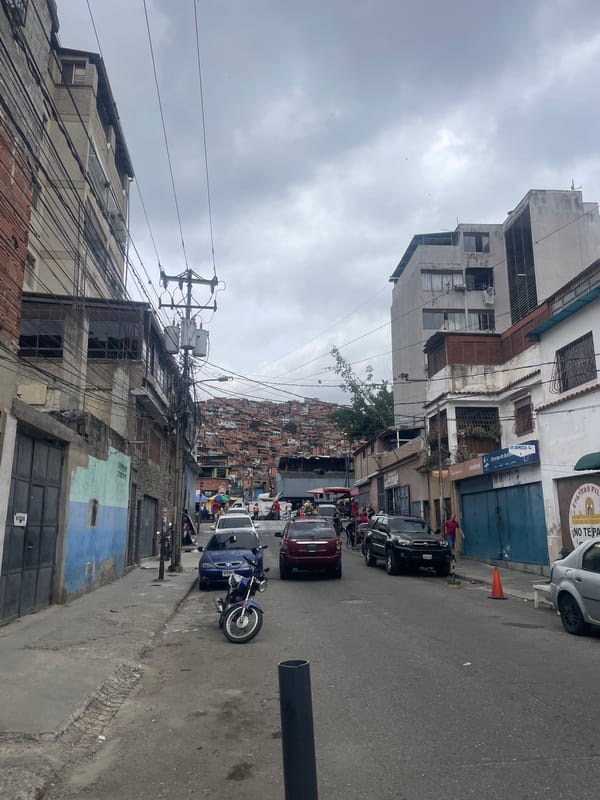 Man with motorcycles observed on Caracas street