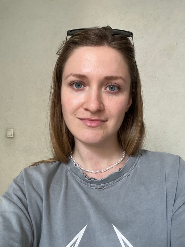 Portrait photograph captured in Novi Sad showing woman in grey shirt