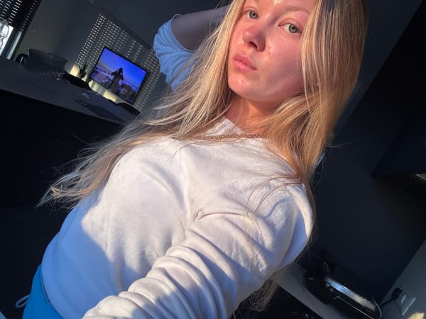 Woman photographed in casual indoor settings in Ariel