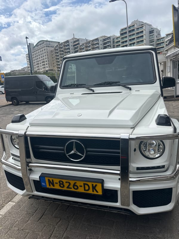 White G-Wagon and cheese shop documented in Noordwijk