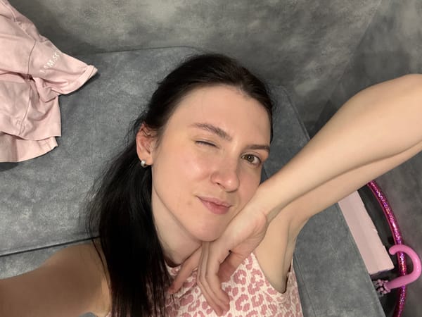 Woman poses for photo on couch in Kazan
