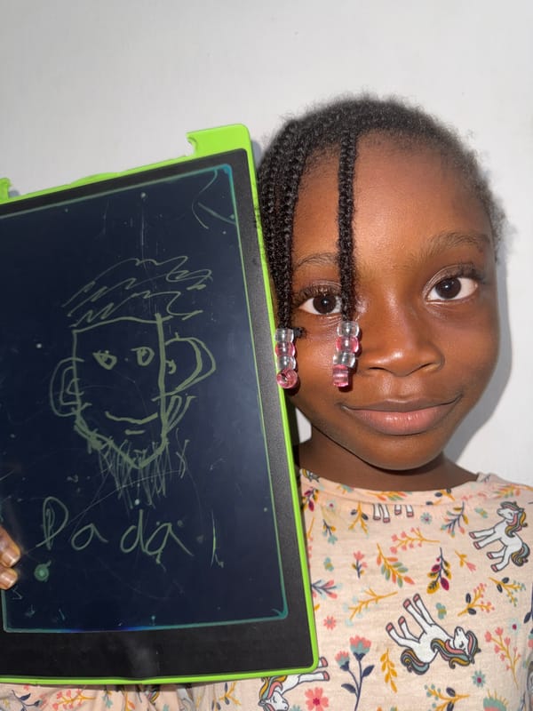 Girl photographed, chalk drawings captured in Ado Nigeria