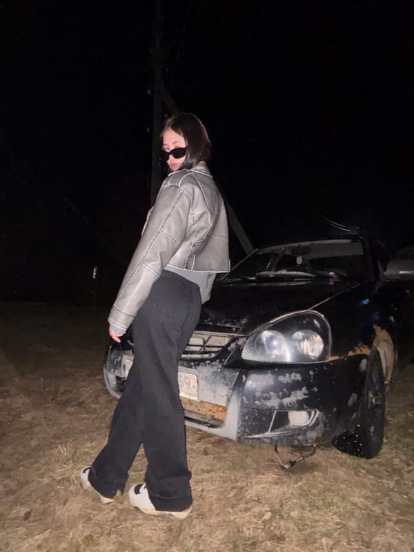 Person photographed with car in various poses, Zhigalki Russia
