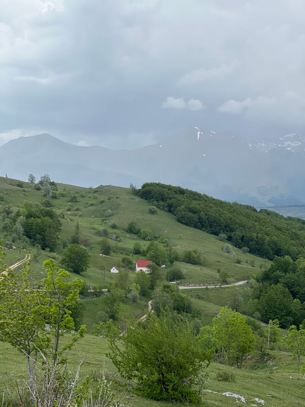 Women road trip through scenic Montenegro mountain village