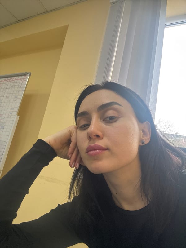 Woman photographed in office setting in Tbilisi
