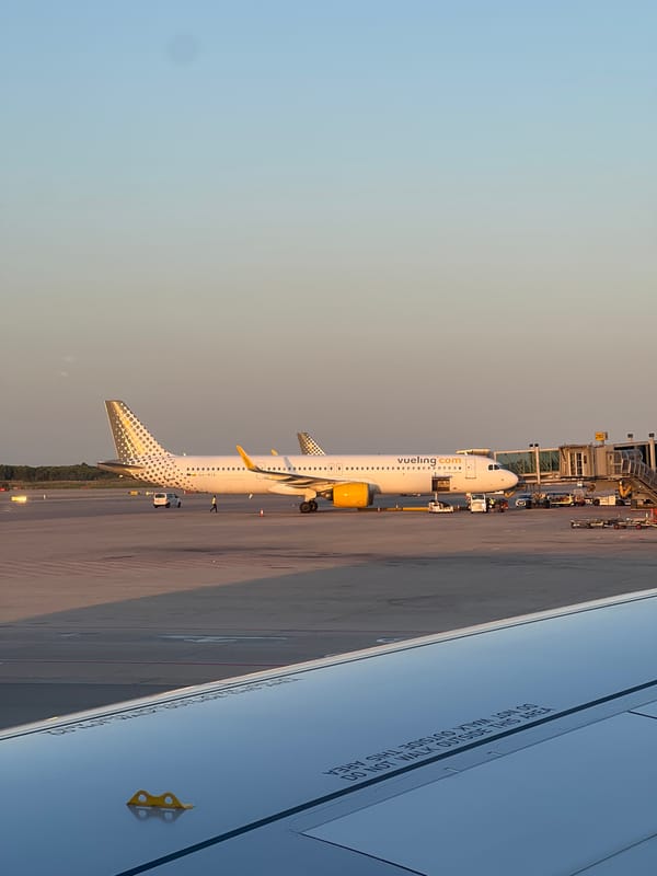 Evening scenes from Barcelona–El Prat Airport, planes at the gate