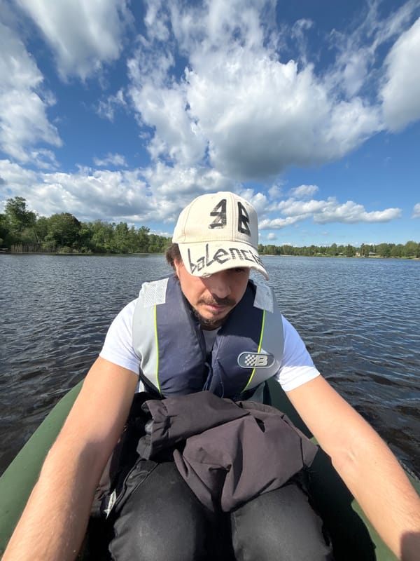 Family lake outing with boating and gazebo gathering documented