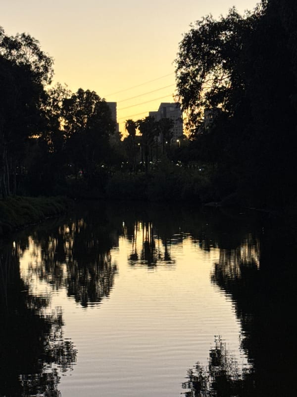 Serene sunset waterfront scene captured in Tel Aviv