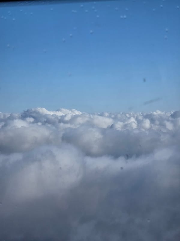 Riding the Zugspitze cable car above the clouds