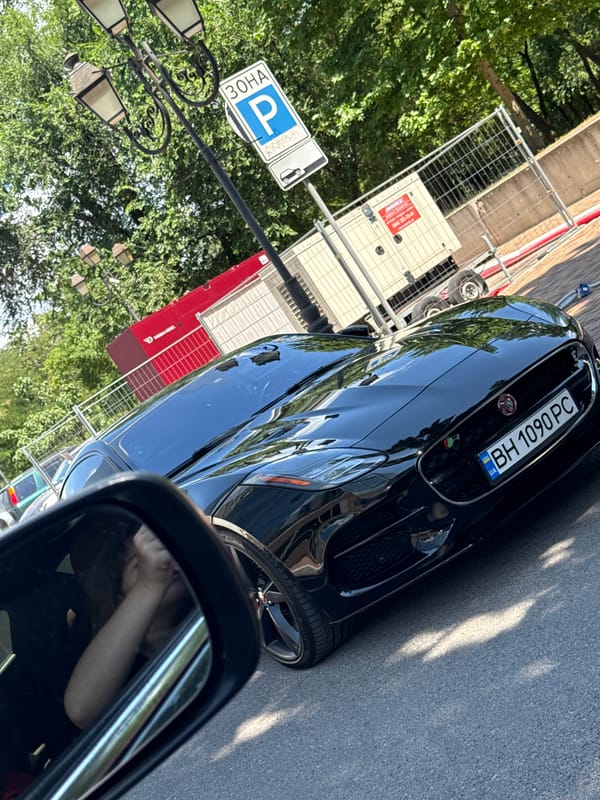 Street-level tour through Odesa's cars, landmarks, and commercial spaces