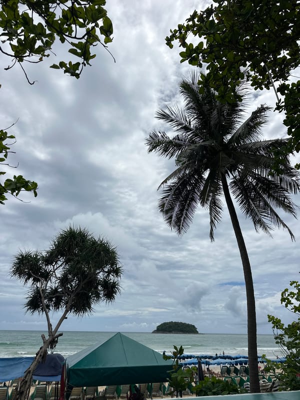 Cloudy morning on Karon Beach, ending with a motorcycle ride