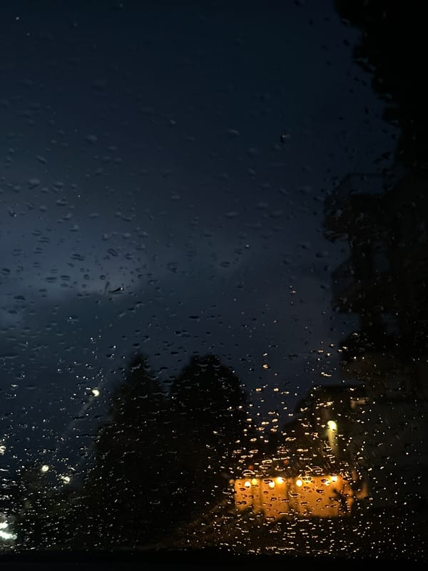 Rainy night documented through windows in Byala, Bulgaria