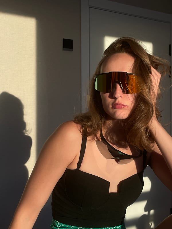 Woman poses with sunglasses indoors in Подшивалово, Russia
