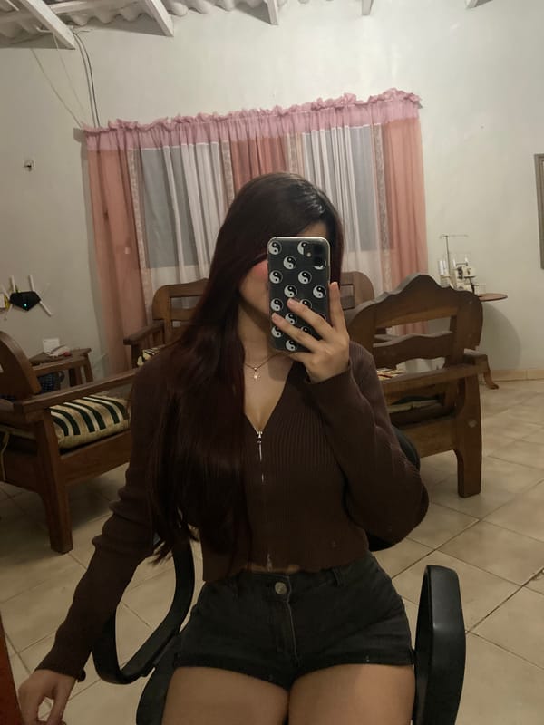 Person takes indoor selfies in Juan Griego, Venezuela