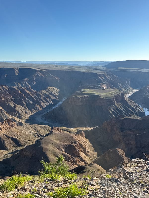 Tourist documents Fish River Canyon views in Namibia