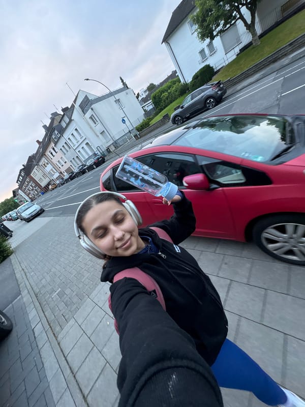Woman takes early morning selfie on Mönchengladbach residential street