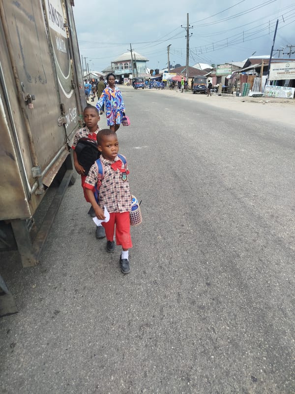 Students and street life on a Yenagoa afternoon
