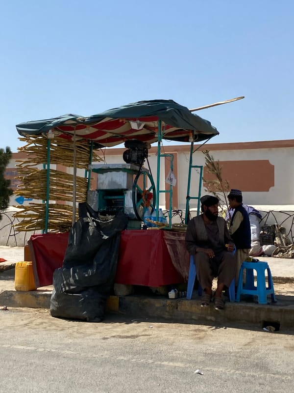 Street vendors and food carts in Kandahar's daily flow