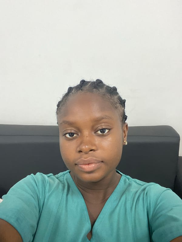 Woman with braided hair observed at unknown location