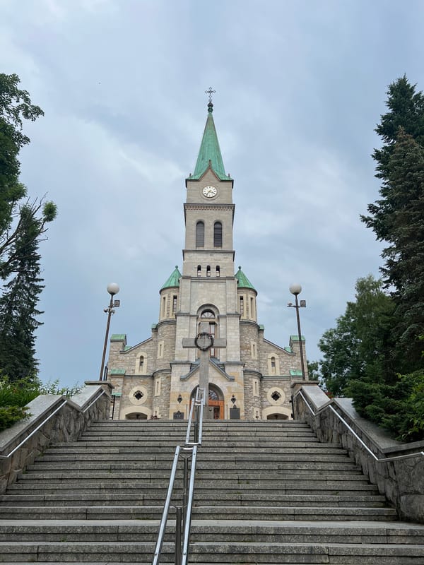 Stone church facade in overcast Zakopane, southern Poland