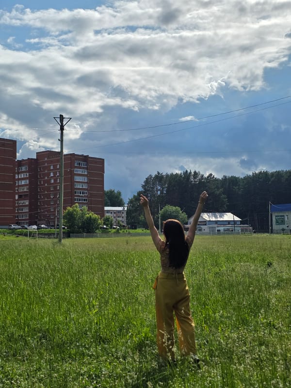 Woman documents park visit and fishing scene in Chaikovsky