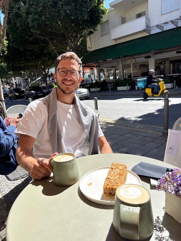 Cafe customers enjoy coffee and pastries in Limassol