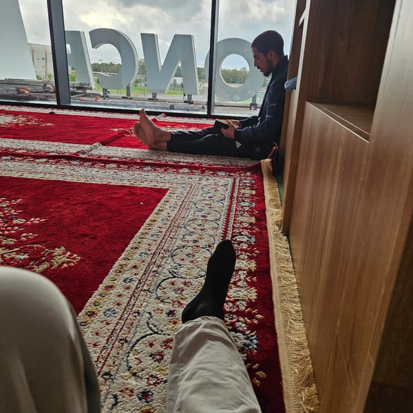 Evening indoor moments captured in Rabat residence with prayer rugs