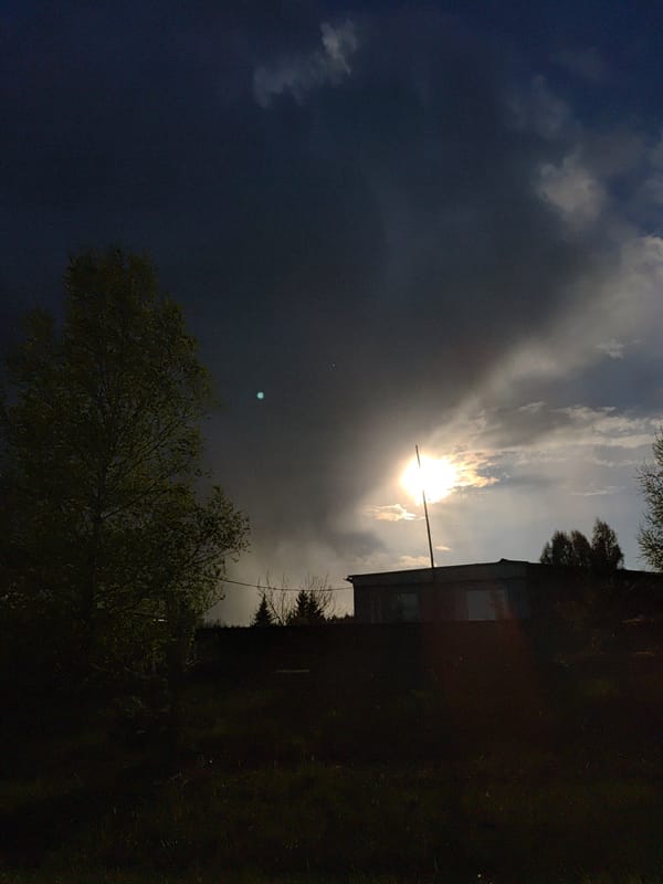 Dramatic sunbeams captured through clouds at Markovo, Russia