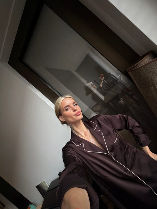 Woman cooks breakfast in Berlin apartment kitchen