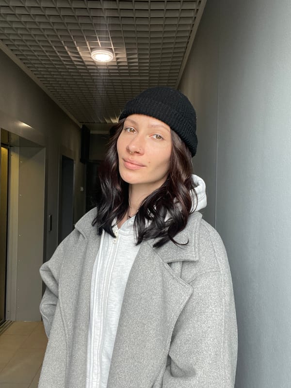 Woman photographed in casual moments with cat in Izhevsk