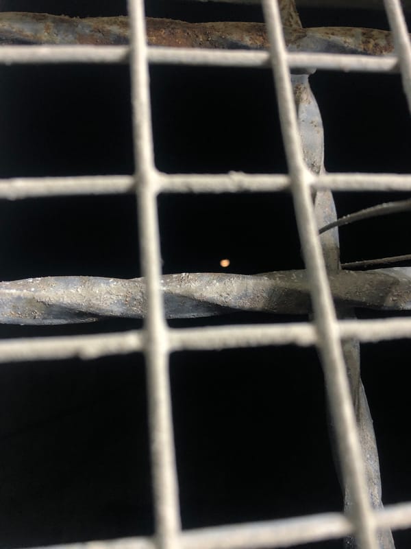 Metal grid photographed in close detail in Juan Griego