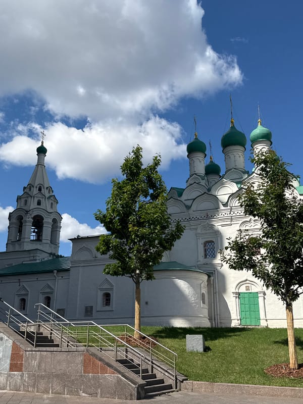 Churches, streets, and scooters in sunny central Moscow