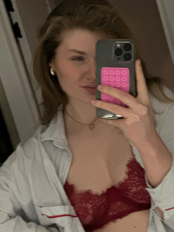 Woman takes indoor selfies in Kazan apartment
