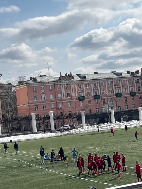 Soccer match documented at Lokomotiv Stadium in Izhevsk, Russia