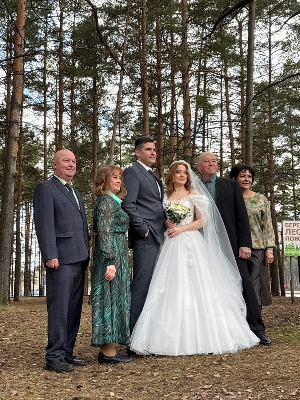 Wedding celebration photographed in pine forest near Chaikovsky, Russia