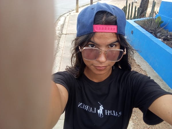 Young people take selfies, hold hands in Juan Griego evening