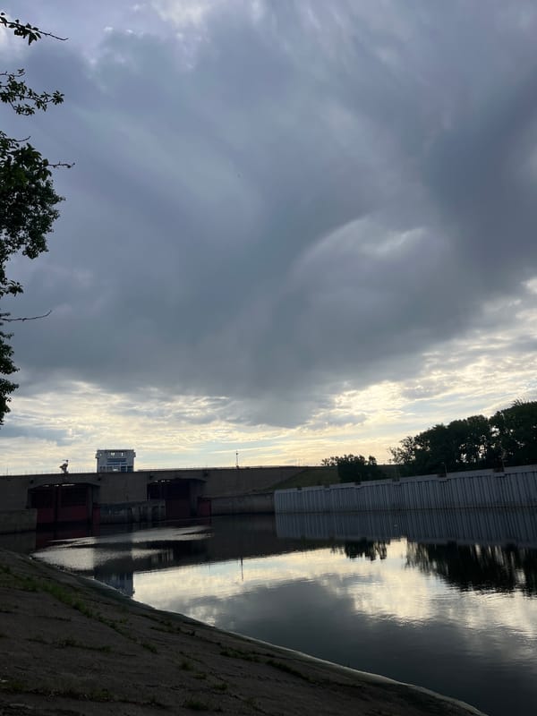 Cyclist documents ride through Chaikovsky, Russia near hydroelectric dam