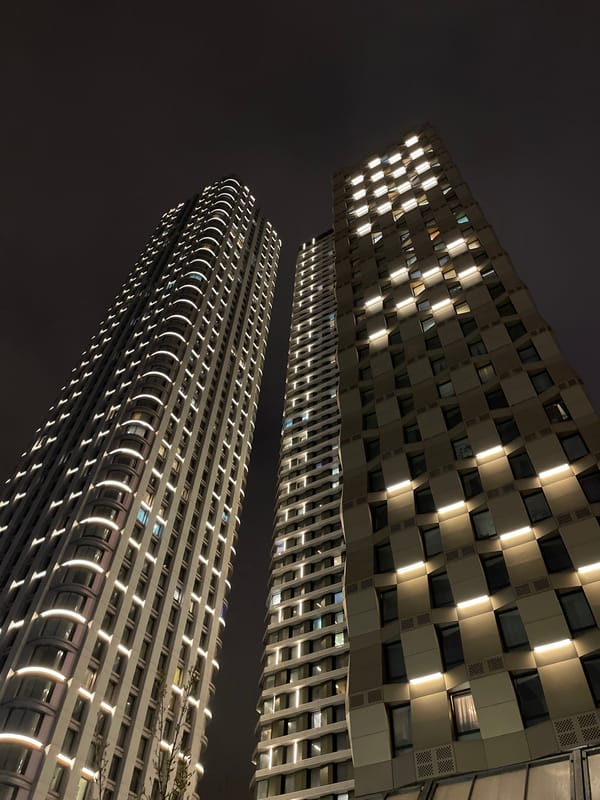 Evening scenes of illuminated buildings and flower bouquets in Khimki