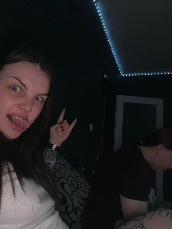 Two women pose for casual photos in Ukrainian coastal town